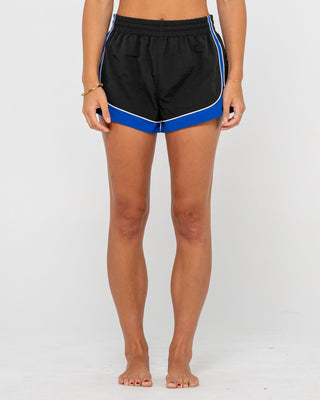 Woman wearing Elastic Panel Crank Boardshort in Coal