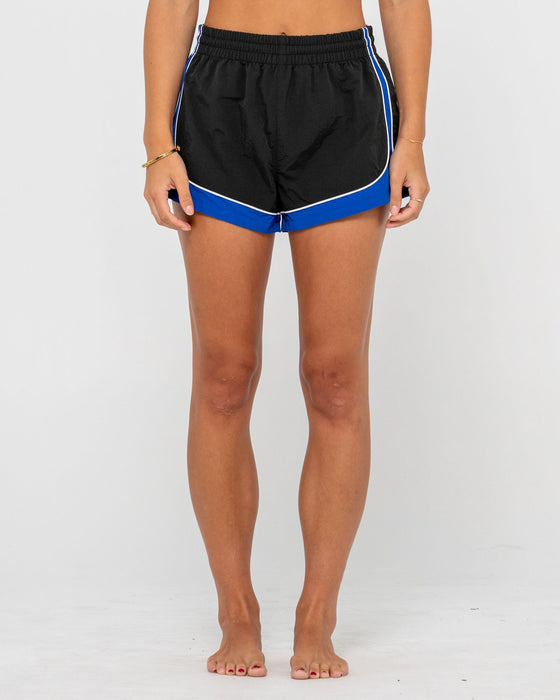 woman-wearing-elastic-panel-crank-boardshort-in-coal