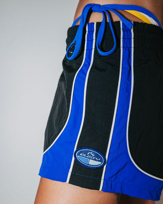 Woman wearing Elastic Panel Crank Boardshort in Coal