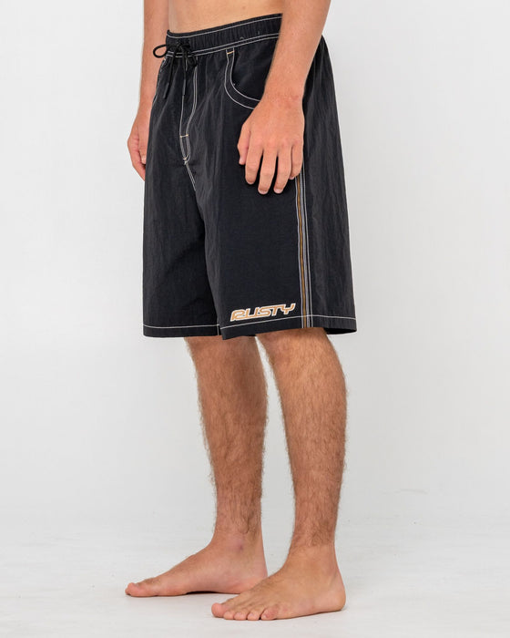 man-wearing-flip-daddy-boardshort-in-black-3