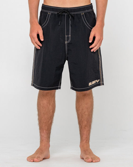 man-wearing-flip-daddy-boardshort-in-black-3