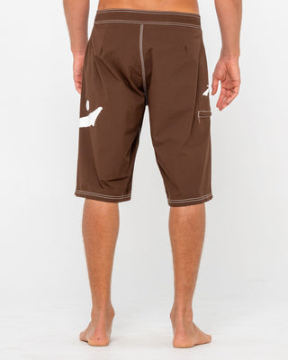 Man wearing Fixed Competition Revolution Boardshort in Pinecone