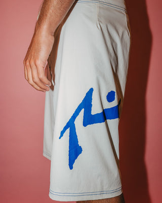 Man wearing Fixed Competition Revolution Boardshort in White