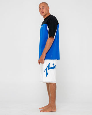 Man wearing Fixed Competition Revolution Boardshort in White