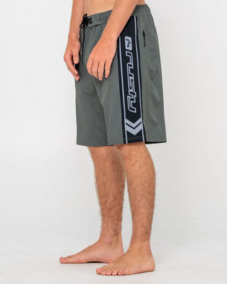Man wearing Spitfire Hybrid Waist Boardshort in Army Green