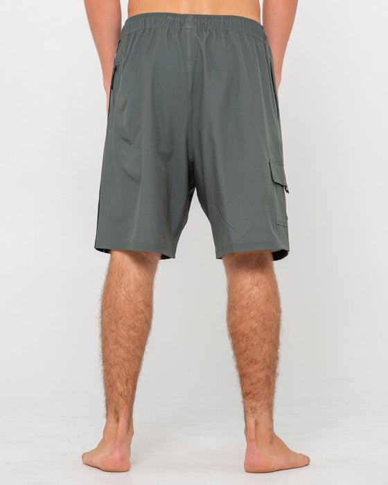 man-wearing-spitfire-hybrid-waist-boardshort-in-army-green