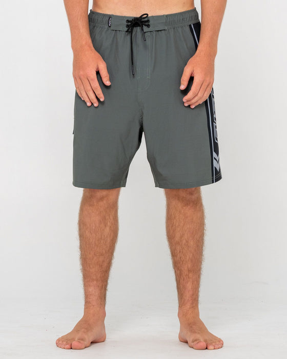 man-wearing-spitfire-hybrid-waist-boardshort-in-army-green