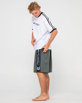 Man wearing Spitfire Hybrid Waist Boardshort in Army Green