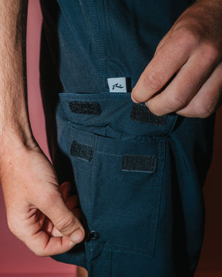 Man wearing Spitfire Hybrid Waist Boardshort in Black