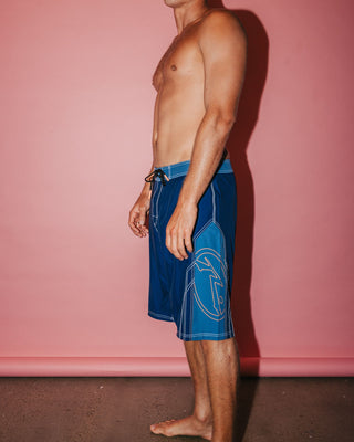 Man wearing Tombstones Fixed Waist Boardshort in Navy Blue