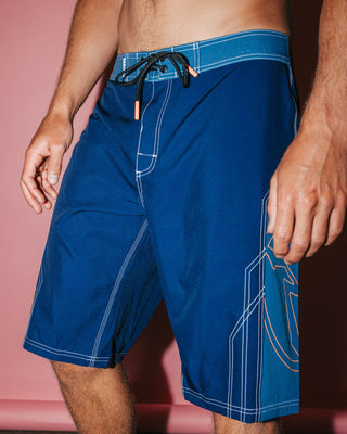 Man wearing Tombstones Fixed Waist Boardshort in Navy Blue