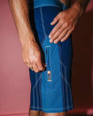 Man wearing Tombstones Fixed Waist Boardshort in Navy Blue