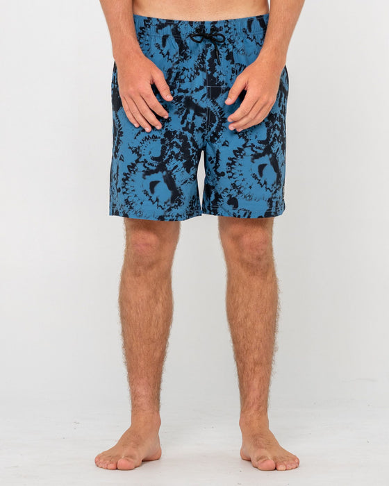 man-wearing-all-over-elastic-waist-boardshort-in-atlantic-blue