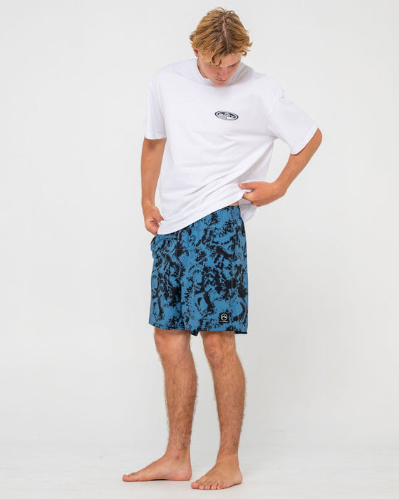man-wearing-all-over-elastic-waist-boardshort-in-atlantic-blue