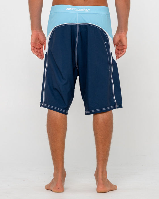 man-wearing-straight-pipe-fixed-waist-boardshort-in-light-blue-navy