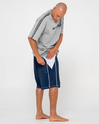 Man wearing Straight Pipe Fixed Waist Boardshort in Light Blue Navy