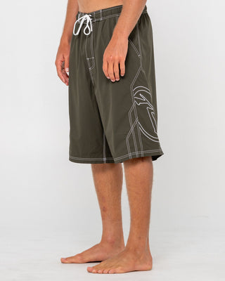 Man wearing Tombstones Hybrid Waist Boardshort in Army Green
