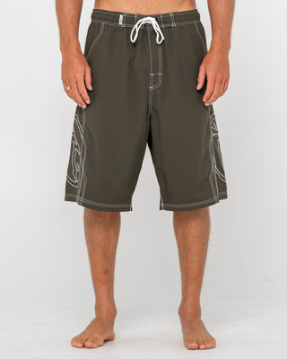 Man wearing Tombstones Hybrid Waist Boardshort in Army Green