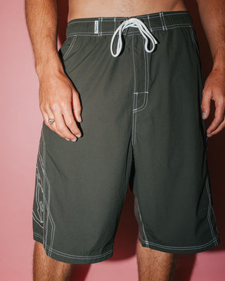 Man wearing Tombstones Hybrid Waist Boardshort in Army Green