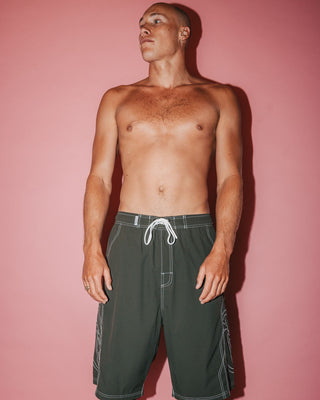 Man wearing Tombstones Hybrid Waist Boardshort in Army Green