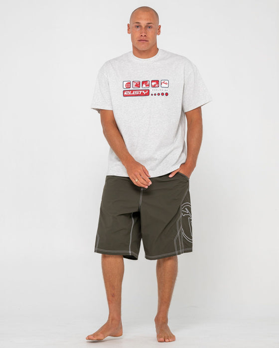 man-wearing-tombstones-hybrid-waist-boardshort-in-army-green