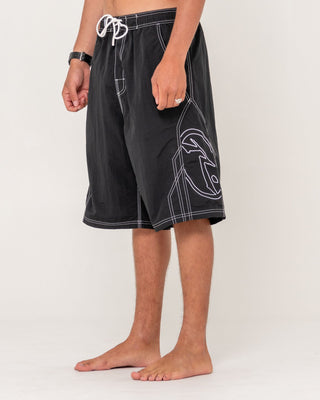 Man wearing Tombstones Hybrid Waist Boardshort in Black