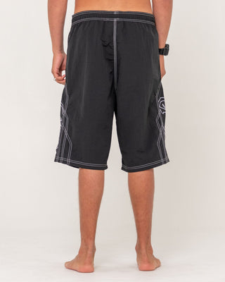 Man wearing Tombstones Hybrid Waist Boardshort in Black