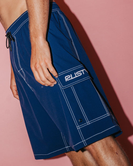 man-wearing-pick-pocket-elastic-waist-boardshort-in-navy-blue