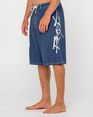Man wearing Hoodus Fixed Waist Boardshort in Navy Blue