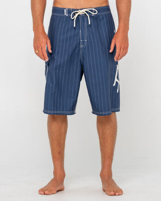 Man wearing Hoodus Fixed Waist Boardshort in Navy Blue