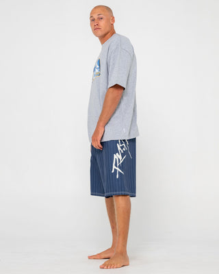 man-wearing-hoodus-fixed-waist-boardshort-in-navy-blue