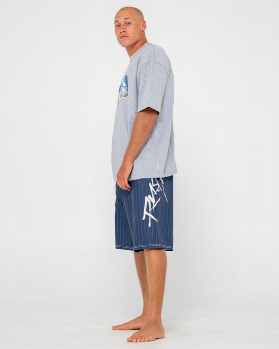 man-wearing-hoodus-fixed-waist-boardshort-in-navy-blue