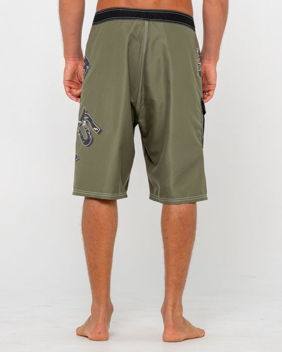 man-wearing-hoodus-fixed-waist-boardshort-in-slate