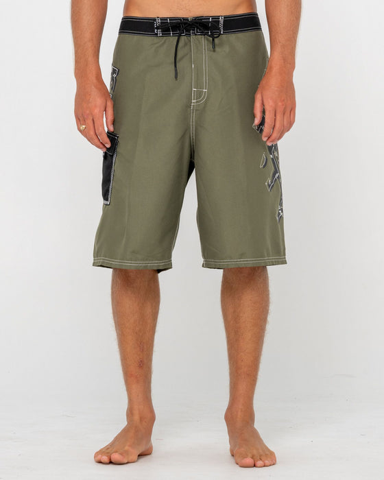 man-wearing-hoodus-fixed-waist-boardshort-in-slate