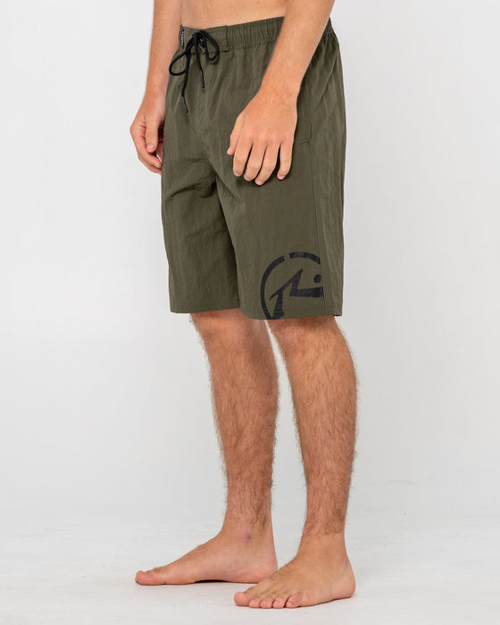 man-wearing-peek-show-hybrid-waist-boardshort-in-army-green
