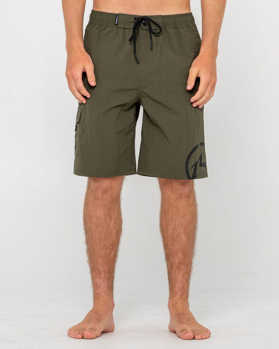 man-wearing-peek-show-hybrid-waist-boardshort-in-army-green