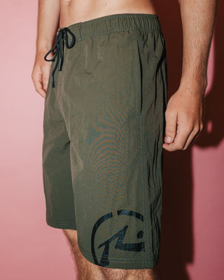 Man wearing Peek Show Hybrid Waist Boardshort in Army Green