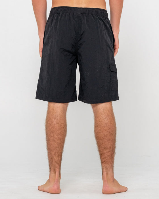 man-wearing-peek-show-hybrid-waist-boardshort-in-black