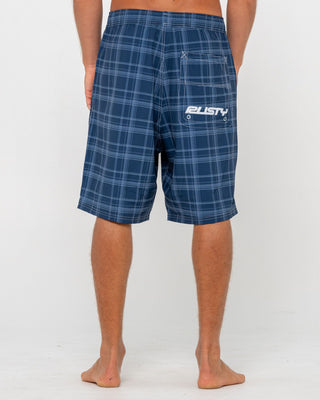 Man wearing Plaid Daddy Elastic Waist Boardshort in Navy Blue