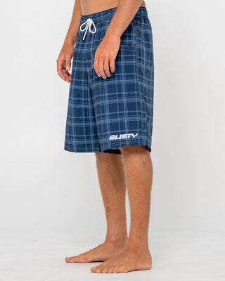 Man wearing Plaid Daddy Elastic Waist Boardshort in Navy Blue