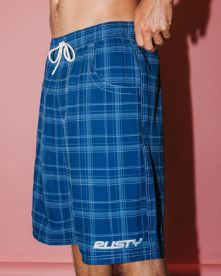 Man wearing Plaid Daddy Elastic Waist Boardshort in Navy Blue