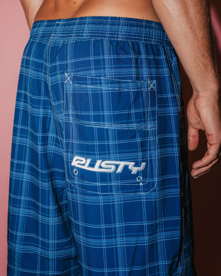 Man wearing Plaid Daddy Elastic Waist Boardshort in Navy Blue