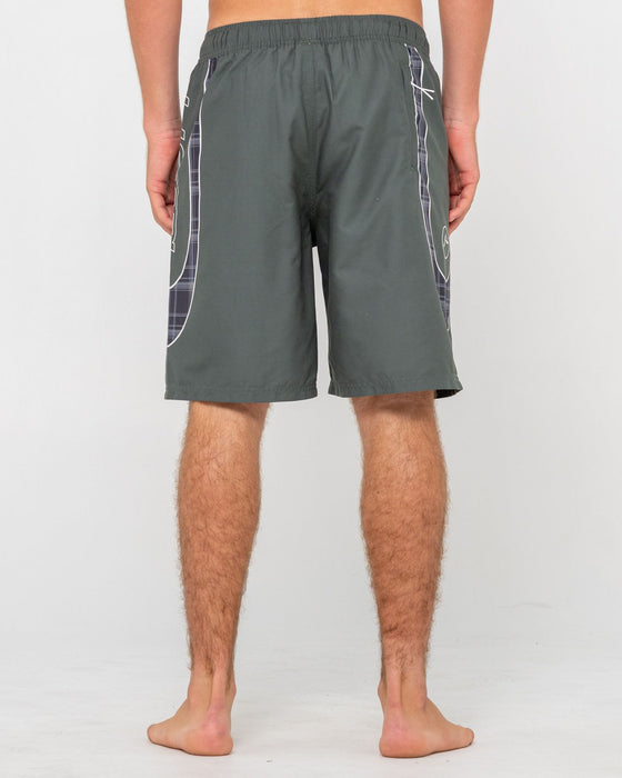 man-wearing-charger-elastic-waist-boardshort-in-army-green