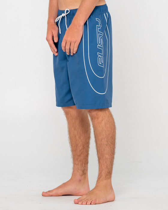 man-wearing-charger-elastic-waist-boardshort-in-atlantic-blue