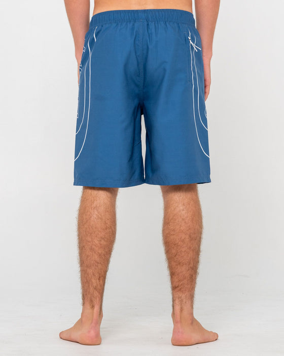 man-wearing-charger-elastic-waist-boardshort-in-atlantic-blue