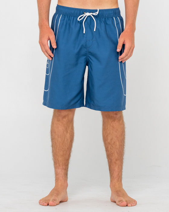 man-wearing-charger-elastic-waist-boardshort-in-atlantic-blue