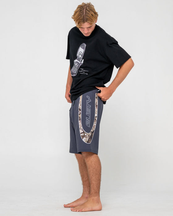 man-wearing-charger-fixed-waist-boardshort-in-coal