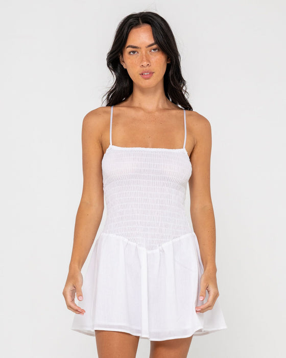 woman-wearing-mimi-smocked-mini-dress-in-white