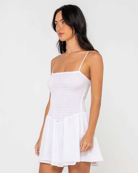 woman-wearing-mimi-smocked-mini-dress-in-white
