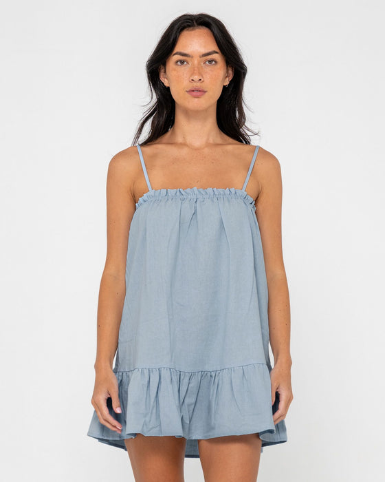 woman-wearing-mary-weather-slip-dress-in-retro-blue